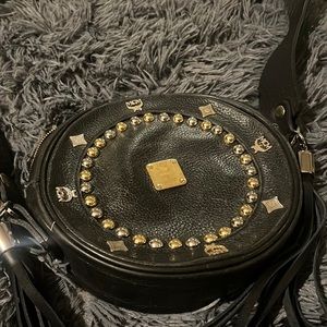 Black and gold AUTHENTIC MCM ha the straps custom made over and tassels to